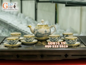 Bộ ấm chén dáng quả hồng men rạn cổ bọc đồng