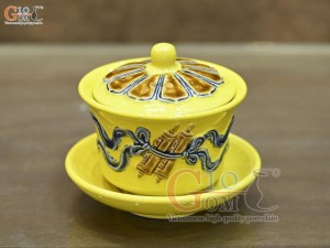 Bát sâm men màu đắp nổi cuốn thư nền vàng