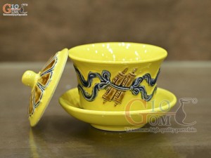 Bát sâm men màu đắp nổi cuốn thư nền vàng