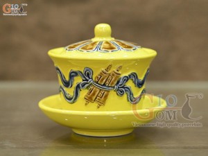 Bát sâm men màu đắp nổi cuốn thư nền vàng