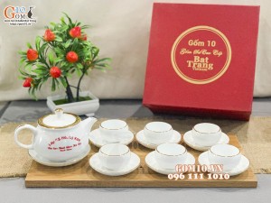 Bộ ấm chén ba chân men trắng kẻ chỉ vàng kim, in logo quà tặng