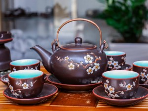 Bộ ấm chén cao cấp Quả hồng đào hoa mai trắng - men nâu - chỉ đỏ