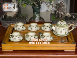 Bộ ấm chén chữ thập men vuốt, vẽ hoa rơi 400ml