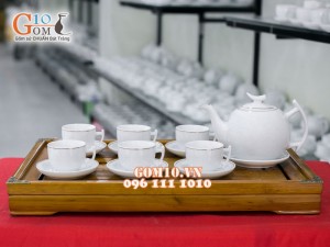 Bộ ấm chén dáng bưởi cành men trắng , kẻ chỉ vàng kim 700ml