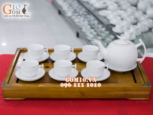 Bộ ấm chén dáng bưởi cành men trắng , kẻ chỉ vàng kim 500ml