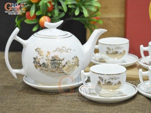 Bộ ấm chén dáng bưởi cành men trắng họa tiết Chùa Một Cột vàng kim, 600ml