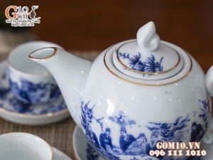 Bộ ấm chén dáng chóp lửa men lam cổ vẽ trúc lâm thất hiền, kẻ chỉ vàng kim 350ml