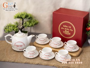 Bộ ấm chén dáng chóp lửa men trắng họa tiết Bồ Công Anh kẻ chỉ vàng, in logo quà tặng 20/11