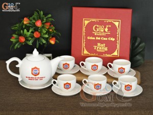 Bộ ấm chén dáng chóp lửa men trắng họa tiết Sen xanh, in logo quà tặng