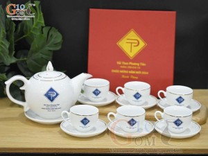 Bộ ấm chén dáng chóp lửa men trắng kẻ chỉ vàng kim - in logo