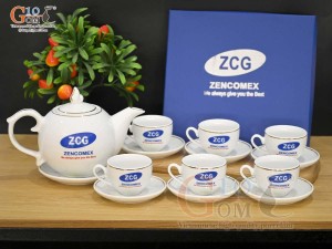 Bộ ấm chén dáng chóp lửa men trắng kẻ chỉ vàng kim - in logo