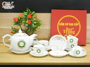 Bộ ấm chén dáng chóp lửa men trắng kẻ chỉ vàng kim - in logo