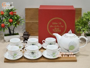 Bộ ấm chén dáng chóp lửa men trắng vẽ Bồ Công Anh chỉ vàng kim, in logo Phan Hoàng Gia