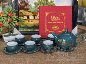 Bộ ấm chén dáng chóp lửa men xanh lục cảnh làng quê kẻ chỉ vàng kim, in logo