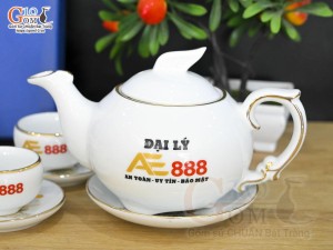 Bộ ấm chén dáng công men trắng cảnh Thuận Buồm Xuôi Gió vẽ vàng 24k, in logo