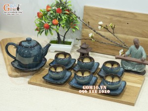 Bộ ấm chén dáng dưa men hỏa biến chén lòng hoa