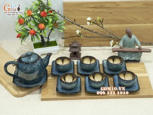 Bộ ấm chén dáng dưa men hỏa biến chén lòng hoa