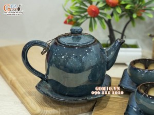 Bộ ấm chén dáng dưa men hỏa biến chén lòng hoa