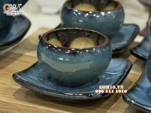 Bộ ấm chén dáng dưa men hỏa biến chén lòng hoa
