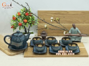 Bộ ấm chén dáng dưa men hỏa biến chén lòng hoa