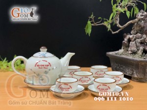 Bộ ấm chén dáng hồng vẽ đào xanh men kem - inlogo