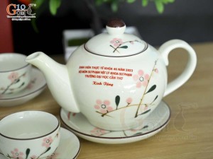 Bộ ấm chén dáng quả hồng men kem vẽ hoa Đào phai inlogo