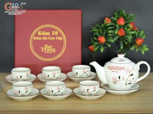 Bộ ấm chén dáng quả hồng men kem vẽ hoa Đào phai inlogo