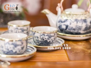 Bộ ấm chén dáng nhật vẽ sen men rạn cổ bọc đồng