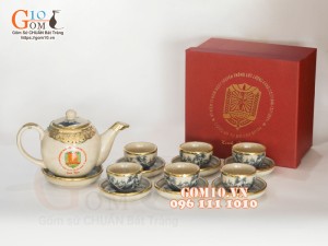 Bộ ấm chén dáng quả đào men rạn cổ bọc đồng, in logo
