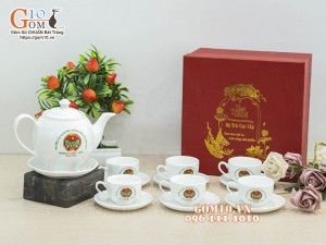 Bộ ấm chén dáng quả đào men trắng - in logo ĐHĐB Hội Nông Dân