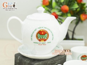 Bộ ấm chén dáng quả đào men trắng - in logo ĐHĐB Hội Nông Dân