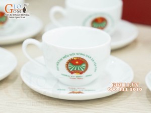 Bộ ấm chén dáng quả đào men trắng - in logo ĐHĐB Hội Nông Dân