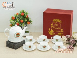 Bộ ấm chén dáng quả đào men trắng - in logo ĐHĐB Hội Nông Dân