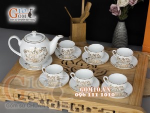 Bộ ấm chén dáng quả đào men trắng họa tiết hoa Sen vẽ Vàng, 600ml