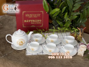 Bộ ấm chén dáng quả đào men trắng kẻ chỉ vàng - in logo