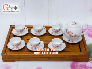 Bộ ấm chén dáng quả đào men trắng vẽ đào phai