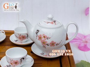 Bộ ấm chén dáng quả đào men trắng vẽ đào phai