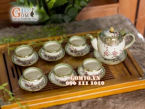 Bộ ấm chén dáng quả đào men vuốt vẽ hoa đào, bọc đồng 500ml