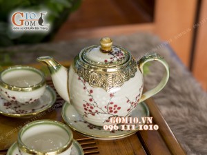 Bộ ấm chén dáng quả đào men vuốt vẽ hoa đào, bọc đồng 500ml