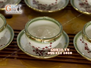Bộ ấm chén dáng quả đào men vuốt vẽ hoa đào, bọc đồng 500ml