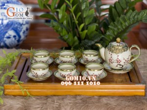 Bộ ấm chén dáng quả đào men vuốt vẽ hoa đào, bọc đồng 500ml