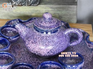 Bộ ấm chén dáng quả hồng men hoả biến tím khay lá sen