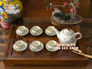 Bộ ấm chén dáng quả hồng men kem vẽ hoa Đào xanh, 350ml