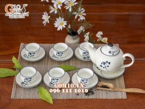 Bộ ấm chén dáng quả hồng men kem vẽ hoa Sen đen, 350ml