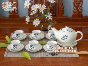 Bộ ấm chén dáng quả hồng men kem vẽ hoa Sen đen, 350ml