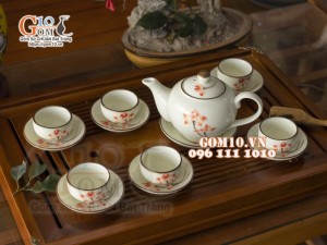 Bộ ấm chén dáng quả hồng men kem vẽ hoa Sen đỏ, 350ml