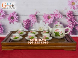Bộ ấm chén dáng quả hồng vẽ sen chỉ nâu