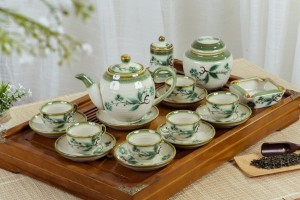 Bộ ấm chén dáng trái đào men vuốt vẽ Tre xanh đầy đủ phụ kiện, dung tích 500ml