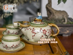 Bộ ấm chén dáng trâu men vuốt, vẽ hoa đào, đầy đủ phụ kiện 350ml