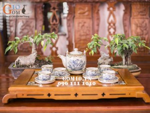 Bộ ấm chén dáng vại vẽ sen men rạn cổ bọc đồng